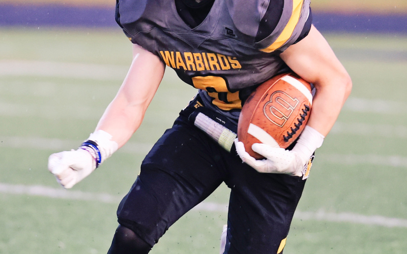 Rio Zaher carries the ball during Friday’s homecoming game.