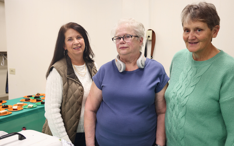 The event couldn’t happen without a host of volunteers, including food servers Teresa Fonder, Ellen Miranda and Gloria Vavra.