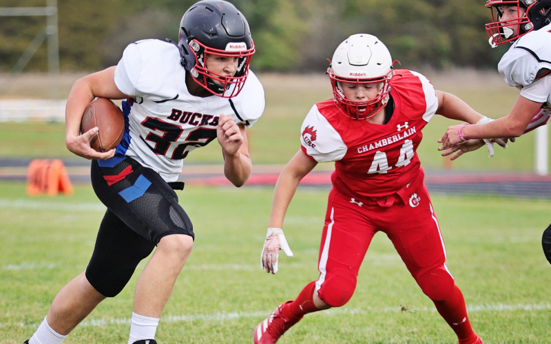 Mauer Jones carries the ball during football action vs. Chamberlain. PHOTO COURTESY KATIE JONES PHOTOGRAPHY