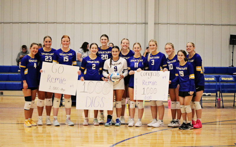Wessington Springs senior Remie Roduner (center) celebrates with her teammates after recording her 1,000th career dig during the 281 Conference Volleyball Tournament on Oct. 4, 2025 in Wessington Springs. (PHOTO / CARMEN WEBER)