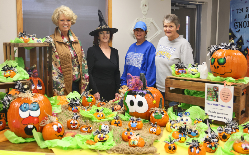 The creativity of Kimberly Ahrenstorff, Becky Thompson, Teresa Fonder and Gloria Vavra transformed farm pumpkins into works of art, raising hundreds of dollars through free will donation for the Springs Area Bus.