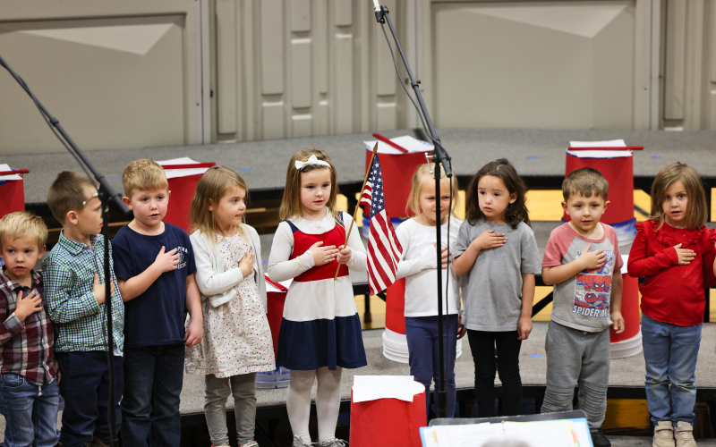 Preschool students led the Pledge of Allegiance.
