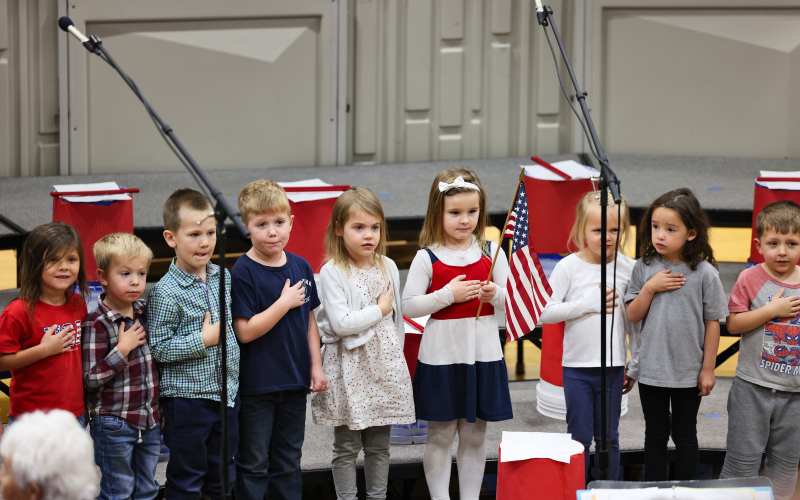 Preschool students led the Pledge of Allegiance.