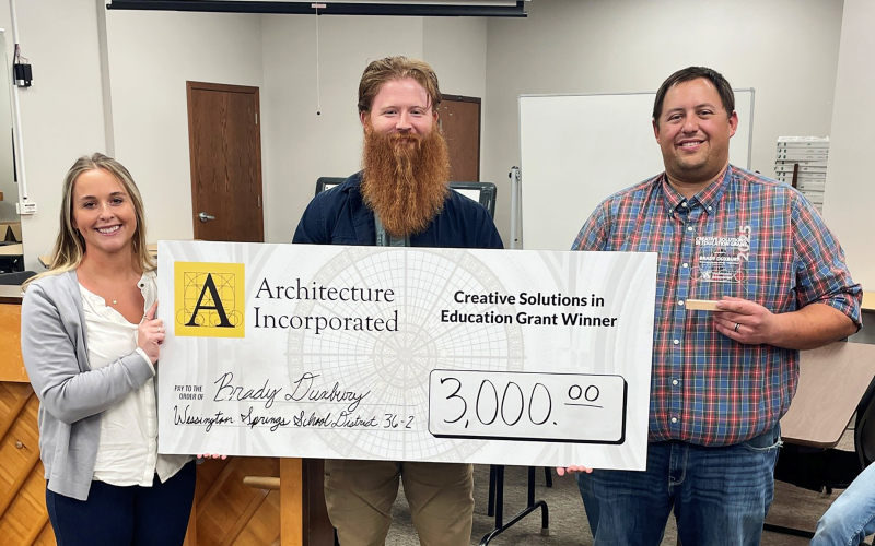 WSHS Vo-Ag Instructor Brady Duxbury (right) is awarded a grant from Architecture Incorporated.