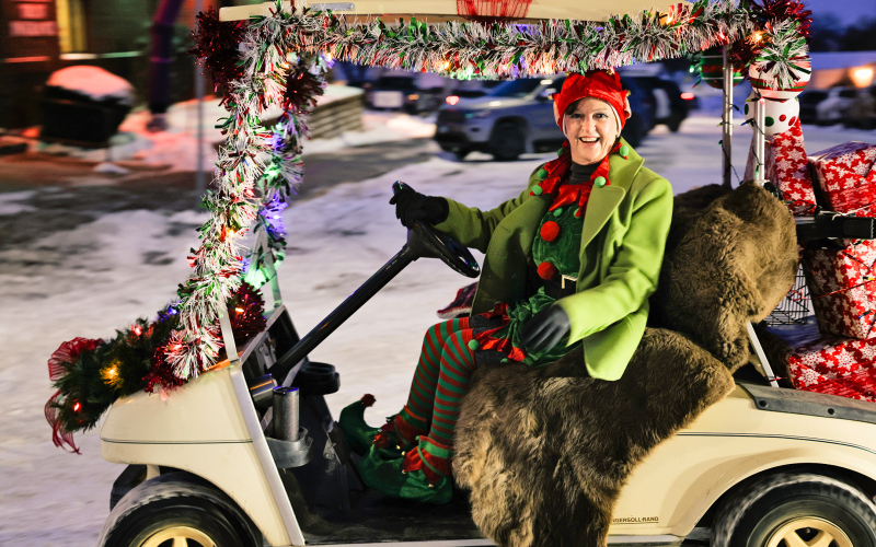 Jolly elf Becky Thompson spearheaded the organization of the inaugural Parade of Lights.