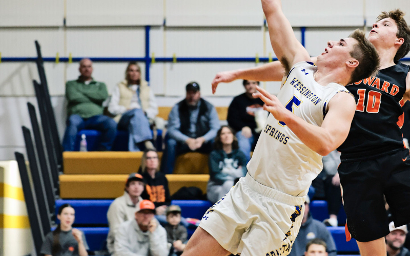 Colby Flowers goes up for a driving layup during Wessington Springs’ 64-58 win over Howard on Saturday, Dec. 20. Flowers led the Spartans with 20 points, shooting 9-of-14 from the field while adding two assists and two blocks