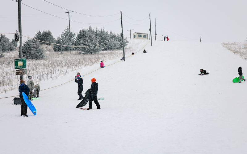 Sledding hill in city park was the gathering place for area kids Sunday afternoon.