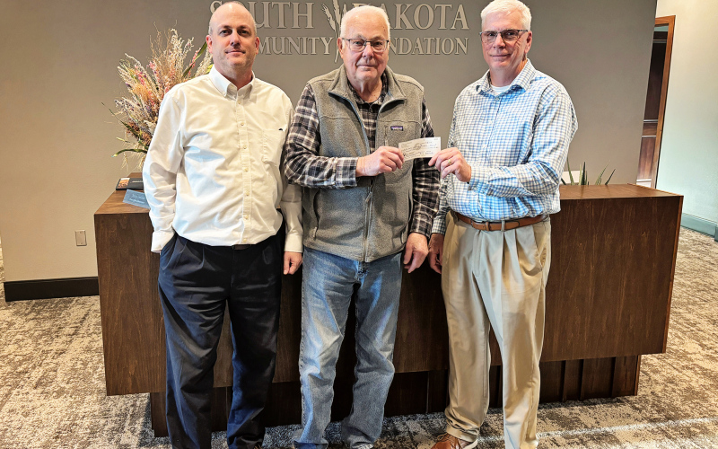 Carol Gildemaster’s son, Mark, and husband, Larry, present Jim Babcock of the Wolsey Community Foundation with a donation in her honor. (PHOTO COURTESY WOLSEY COMMUNITY FOUNDATION)