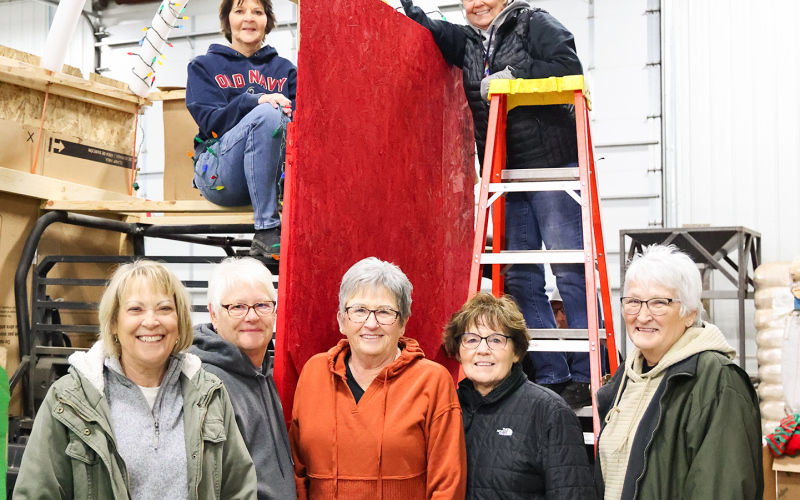 Taking a break from decorating their Santa’s Workshop-themed float, members of the Wessington Book Club are pictured. Top, left to right: Marla Lichty and Jane Fritzsche. Lower, left to right: Patty Schilling, Mary Ann Hedge, Karen Clarke, Becky Resel and Sharon Wuestewald.