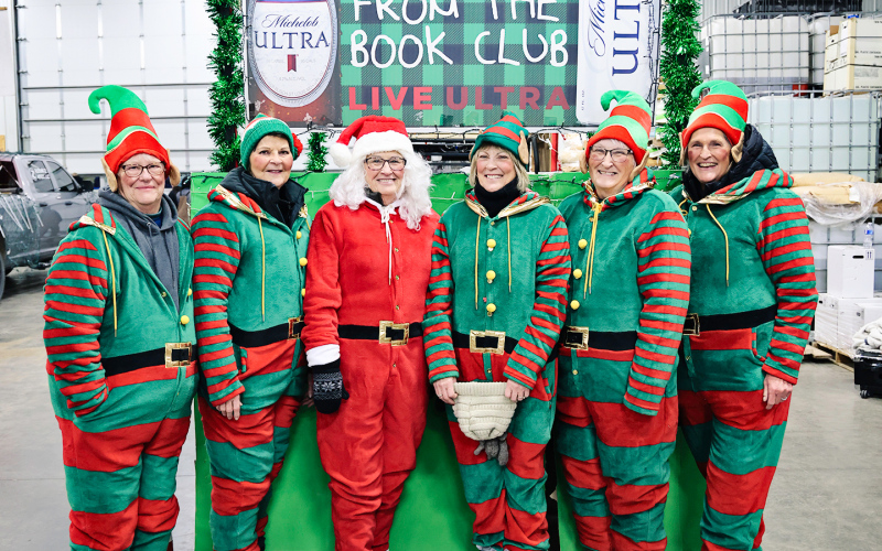 Members of the Wessington Book Club got into the holiday spirit, dressing as Santa and elves while riding in the Wessington Parade of Lights. Shown left to right are Mary Ann Hedge, Marla Lichty, Karen Clarke, Patty Schilling, Sharon Wuestewald and Chris Duxbury.