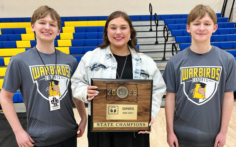 Jackson and Jayden Eggleston “The Twins” won the 2026 state championship title in Mario Kart. They are shown with Esports coach Haley Asimakopoulos.