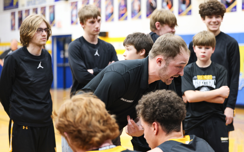 Wolsey-Wessington head coach Austin Kemnitz encourages his players from the sideline during the Warbirds’ Region 2B quarterfinal matchup against Wessington Springs on Tuesday, March 3.  View more photos from the game at www.truedakotan.com, click on Photo Galleries. (KRISTI HINE / TRUE DAKOTAN)