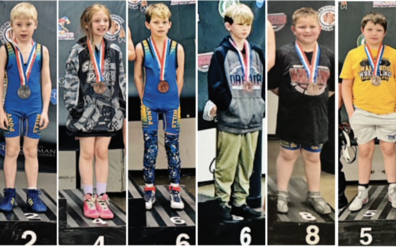 Pictured (from left) are Pony Hills wrestlers Brecken Jensen (second), Mary Tanke (fourth), Kix Coleman (sixth), Kaddilac Coleman (sixth) and Hayes Cashman (eighth), along with Wolsey-Wessington wrestler Callen Carter (fifth).