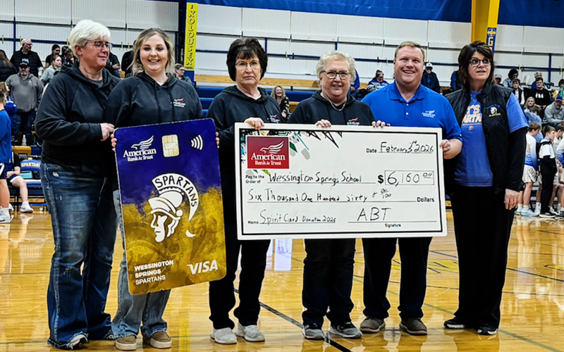 Wessington Springs Spartans received a check for $6,161 to help support general education needs. Shown left to right are: AB&amp;T Wessington Springs branch employees Melanie Schelske, Kathy Wetzel, Susan Tebay, Connie Larson, Blake Willman and Wessington Springs Elementary School Principal Becky Fjerstad. (PHOTOS COURTESY AB&amp;T)