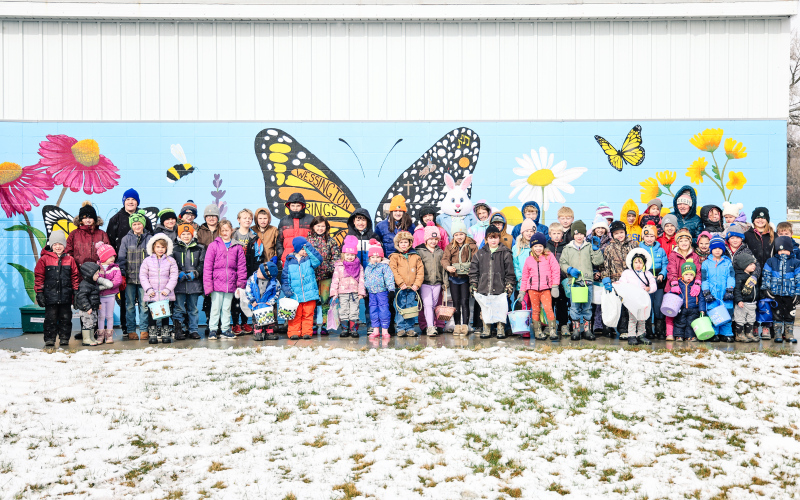 Participants gather for the traditional group photo, a longtime True Dakotan Easter egg hunt tradition spanning decades.
