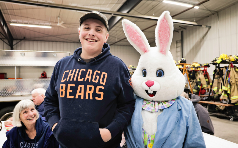 Wessington Springs High School freshman JR Hine proves you’re never too old to pause for a photo with the Easter Bunny, as his grandma, Delia Atkinson, looks on with a laugh.