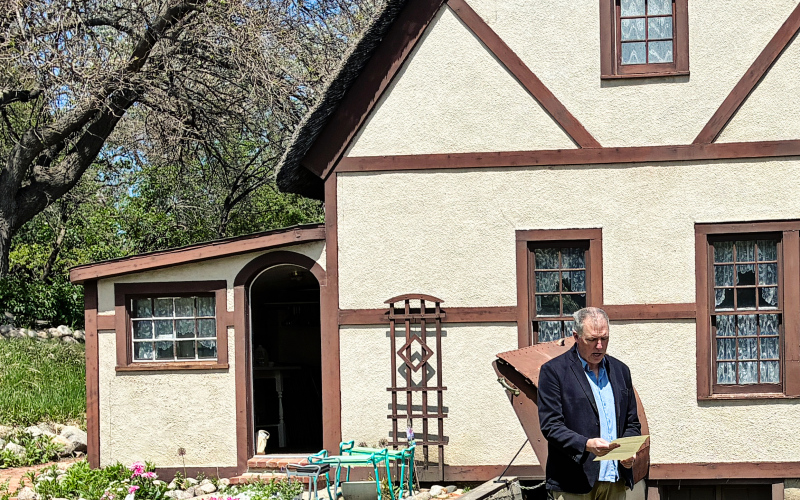 Pastor Mike Easter offers a blessing over the plants and volunteers before the start of the Shakespeare Garden Planting Festival in Wessington Springs. (PHOTO COURTESY JIM FERGUSON)