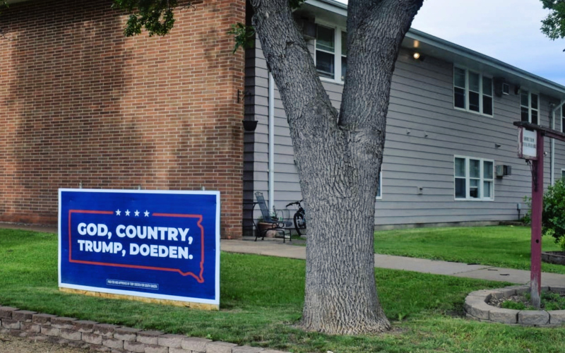 A Toby Doeden campaign sign outside 9 East 10th St in Groton, S.D. on June 15, 2026. The building is an apartment complex that Doeden’s 5-Star Management company operates. (Photo: Molly Wetsch/South Dakota News Watch)