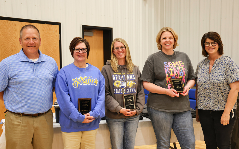 Wessington Springs School District Superintendent Jason Kolousek, left, and Wessington Springs Elementary Principal Becky Fjerstad, right, join Teachers of the Year recipients Niki Hainy, Kim Orth and Sarah Larson following the presentation of the district’s annual staff awards. The three elementary educators were recognized for their dedication to student success and their positive impact on the school community.