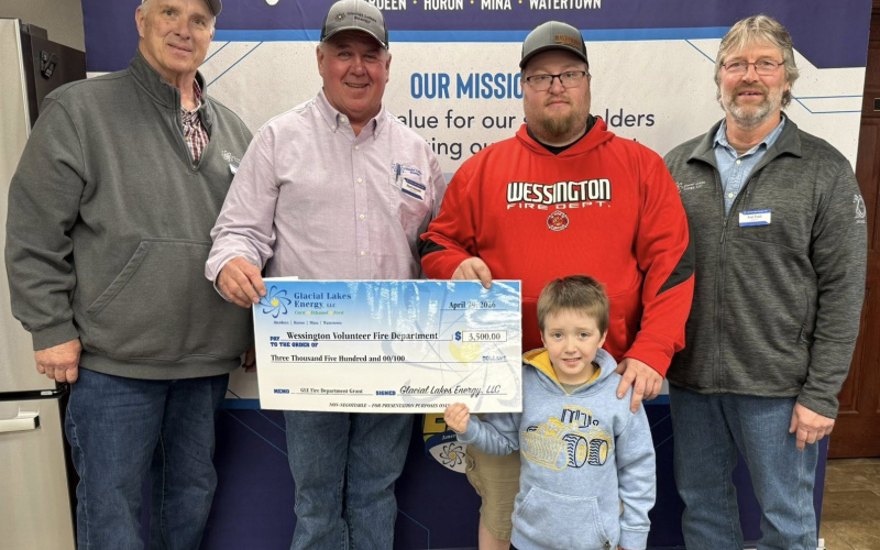 Presenting the grant check are GLE Board of Directors representatives Mark Schmidt, Brent Gabler, and Noel Pond. Accepting the check on behalf of the Wessington Fire Department is Jimmy Hanks, Fire Chief.