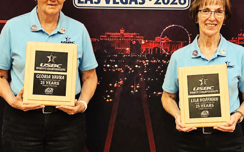 Gloria Vavra (left) and Lila Hoffman display the plaques they received recognizing their 25th appearances at the USBC National Women’s Bowling Championships.