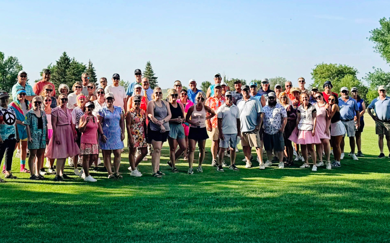 Golfers gather before teeing off at the Donna Rae Memorial 9-Hole Best Ball Tournament on July 17 at the Springs Country Club. The annual fundraiser raised more than $1,000 for an addition to the club's new cart shed, including storage space for the Wessington Springs Spartan golf team, while honoring the memory of Donna Rae and her legacy of giving back to the community. (PHOTO COURTESY REGINA TEVELDAL)