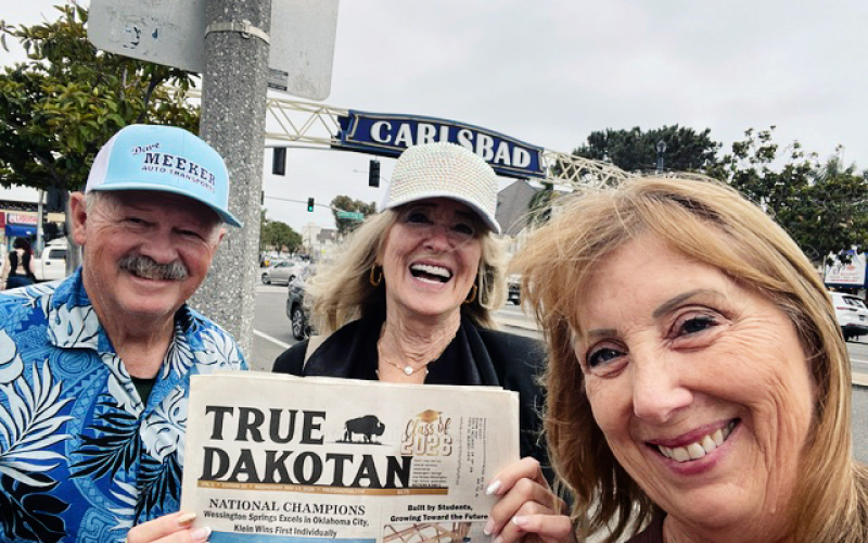 Glenda (Grohs) Key, center, and Monte and Lana (Swanson) Fastnacht pause for a photo with the True Dakotan during an unexpected reunion in downtown Carlsbad, Calif. Glenda and Monte were country neighbors and attended Central School together. The longtime friends were thrilled to reconnect while the Fastnachts were passing through the area during their travels. (PHOTO COURTESY GLENDA KEY)
