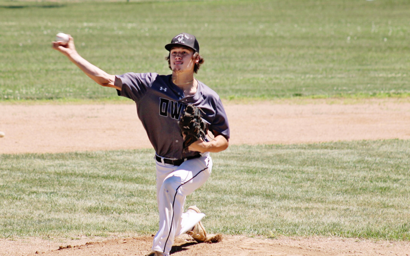 Springs Owl pitcher Bubba Peterson delivers a pitch during a first game doubleheader in Springs on Sunday. Despite 96 degree temperatures, Peterson pitched a six-inning 12-1 victory over the Chamberlain Mallards, striking out ten batters. (PHOTOS BY CRAIG WENZEL FOR THE TRUE DAKOTAN)