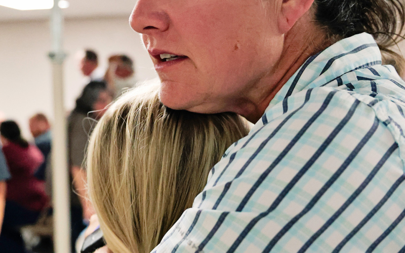 Jacki Bultsma comforts her daughter, Hayden, following an emotional meeting Thursday, Aug. 20, at St. Wilfrid Catholic Church in Woonsocket, where Diocese of Sioux Falls leaders announced St. Joseph Catholic Church in Wessington Springs will not be rebuilt.