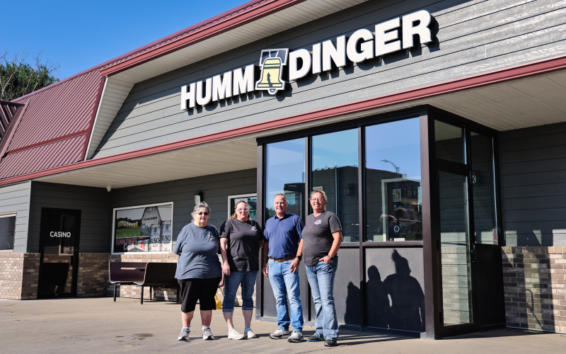 New Humm Dinger owner Cory Zacher, second from right, stands with members of the staff he credits with helping make his decision to purchase the Wessington Springs convenience store following the death of his brother, Jason. Pictured from left are Gerri Bader, Ellen Tobin, Zacher and Juli Jacobs. (KRISTI HINE / TRUE DAKOTAN)