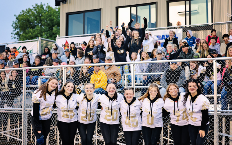 The Wolsey-Wessington cheer squad fires up an enthusiastic homecoming crowd as fans cheer on the Warbirds during Friday night’s 56-6 win over Sunshine Bible Academy.