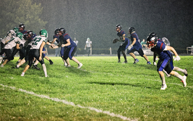 The WWSSC Bucks battle through wet conditions during their homecoming matchup Friday night. ABOVE:  (KRISTI HINE / TRUE DAKOTAN)