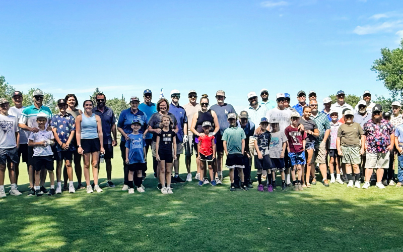 Generations Tee Off Together in Alternate-Shot Youth-Adult Tournament