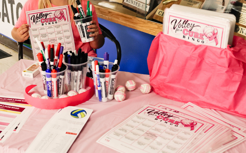 Amelia Grohs helps coordinate Volley for a Cure bingo, a new addition to this year’s event.