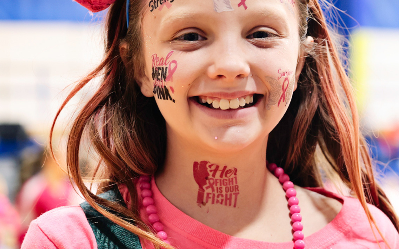Mary Tanke vies for the title of “pinkest fan.”