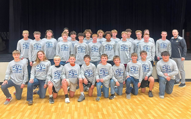 Warbird football players wore shirts featuring Matthew Donovan’s name and jersey number, with proceeds from shirt sales benefiting the family. (PHOTO BY KERRI ZOMER)