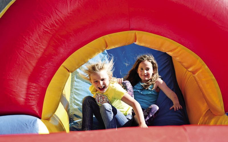 Young participants enjoy the bounce house during a previous Leap to Lane celebration in Lane. New for 2026, organizers have added a bicycle rodeo, kid’s bicycle poker run, micro derby, new live music, plus expanded food options to the annual event scheduled for Saturday, June 20. See the full schedule in this print and e-edition on PAGE EIGHT (TRUE DAKOTAN FILE PHOTO)