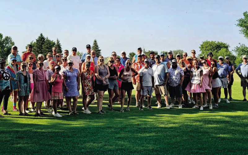 Golfers gather before teeing off at the Donna Rae Memorial 9-Hole Best Ball Tournament on July 17 at the Springs Country Club. The annual fundraiser raised more than $1,000 for an addition to the club's new cart shed, including storage space for the Wessington Springs Spartan golf team, while honoring the memory of Donna Rae and her legacy of giving back to the community. (PHOTO COURTESY REGINA TEVELDAL)