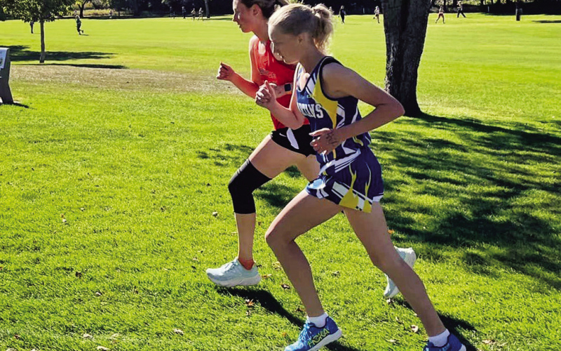 PHOTO COURTESY BECKY KRUEGER During last week’s Lakeside Invitational in Faulkton, WSHS student athlete Alexis Roesler positioned herself well in the field and ran determined to lead the third group of girls. She medaled in 12th place running 23:03.09.