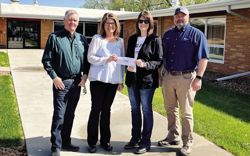 Shown during a check presentation at Weskota Manor Avera in Wessington Springs, left to right are: Brian Bergeleen, District 2 Venture Communications Board Member; Nikki VonEye, Weskota Manor Avera Administrator; Mary Knox, Marketing Manager at Venture Communications Cooperative; Scott Miller, Venture Communications IR Tech. COURTESY PHOTO