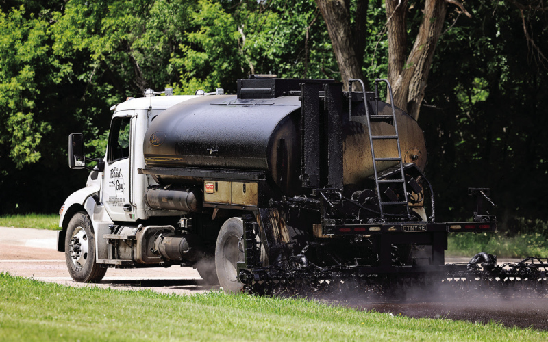 The Road Guys apply the long-awaited Otta Seal surface to 2nd Street in Wessington Springs on Tuesday, June 16. The work marks a major milestone in a project that was awarded in 2023, delayed multiple times and ultimately required the City of Wessington Springs to call the contractor's bond before work resumed this spring. Remaining paving at several intersections will be completed after the city's separate water main replacement project is finished.