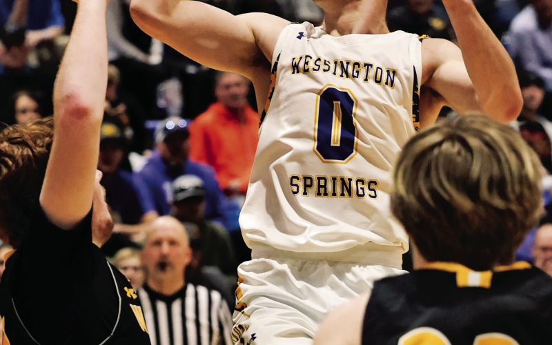 Karter Mebius soars to the hoop during Region 2B semifinal action Saturday, March 8, 2025 at the Dakota State University Fieldhouse in Madison, SD. The Spartans defeated the Warbirds 61-37, punching their ticket to SoDak 16. KRISTI HINE / TRUE DAKOTAN