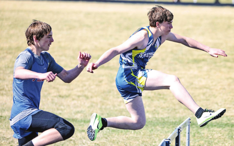 Going over the hurdles in 7th boys 100 low Hurdles was Nathan Gaikowski in 20.46 for 1st place.