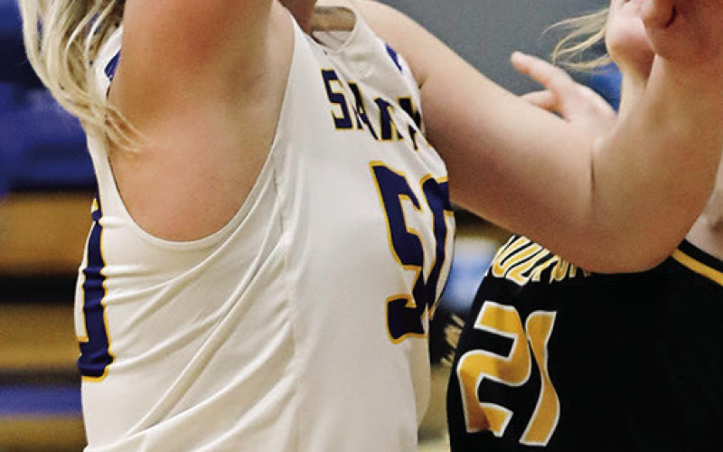 Avery Orth, Kirstie Munsen and Raylee Fagerhaug during home basketball action vs. Faulkton. The Spartan girls came away with a 52-36 win. KRISTI HINE TRUE DAKOTAN CLOCKWISE FROM LEFT: