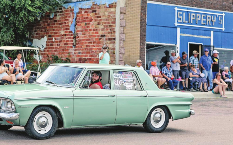 As part of his 90th birthday celebration, Neal Barber’s 1965 Studebaker made a stylish addition to the parade.