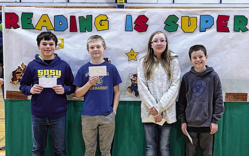 5th grade class receiving their AR plaques Chase Wenzel, Casen Water, Kylie Edwards, Henry Feistner.