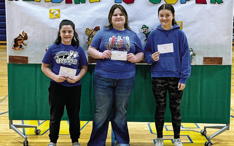 6th grade class receiving their AR plaques Bailey Mentele, Kambrie Eik, Kaycee Scheel.