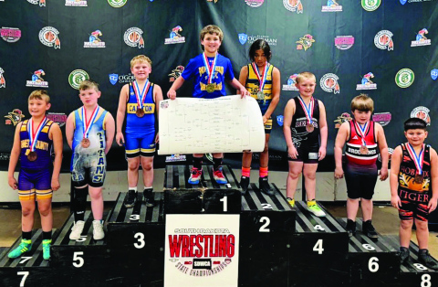 McCrae Nickels stands atop the podium after earning a first-place finish at the AAU state wrestling tournament held at the Sioux Falls Arena March 20-21, 2026. (COURTESY PHOTO)