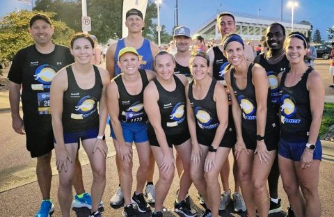 437 Project runners (Left to right): Matt Smith, Whitney Lucas Molitor, Allison Weber, Paul TenHaken, Kristen De Berg, Ryan Flogstad, Lesley Fite-Boltjes, Alex Pool, Wendy Johnson, Benson Langat, Kelly Marshall (missing from the photo is runner Greg Koch).
