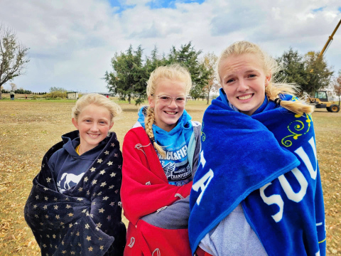 Pictured left to right, Alexis Roesler, Ella Kolousek and Abby Kolousek advance as a team to the state cross country meet October 22, 2022. PHOTO COURTESY BECKY KRUEGER